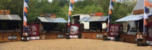 British event catering shacks set up ready to serve public. Including a pork shack, german sausage shack and chicken shack