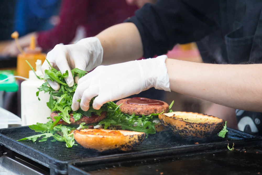burgers being prepared, street food catering services