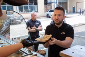 Guests queuing at catering unit for the AkzoNobel roadshow event in Didcot
